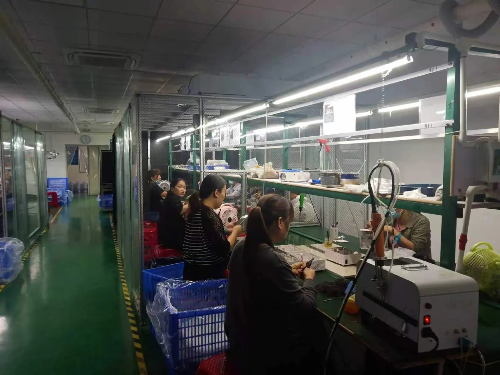 Assembly workstations inside the Shenzhen factory.